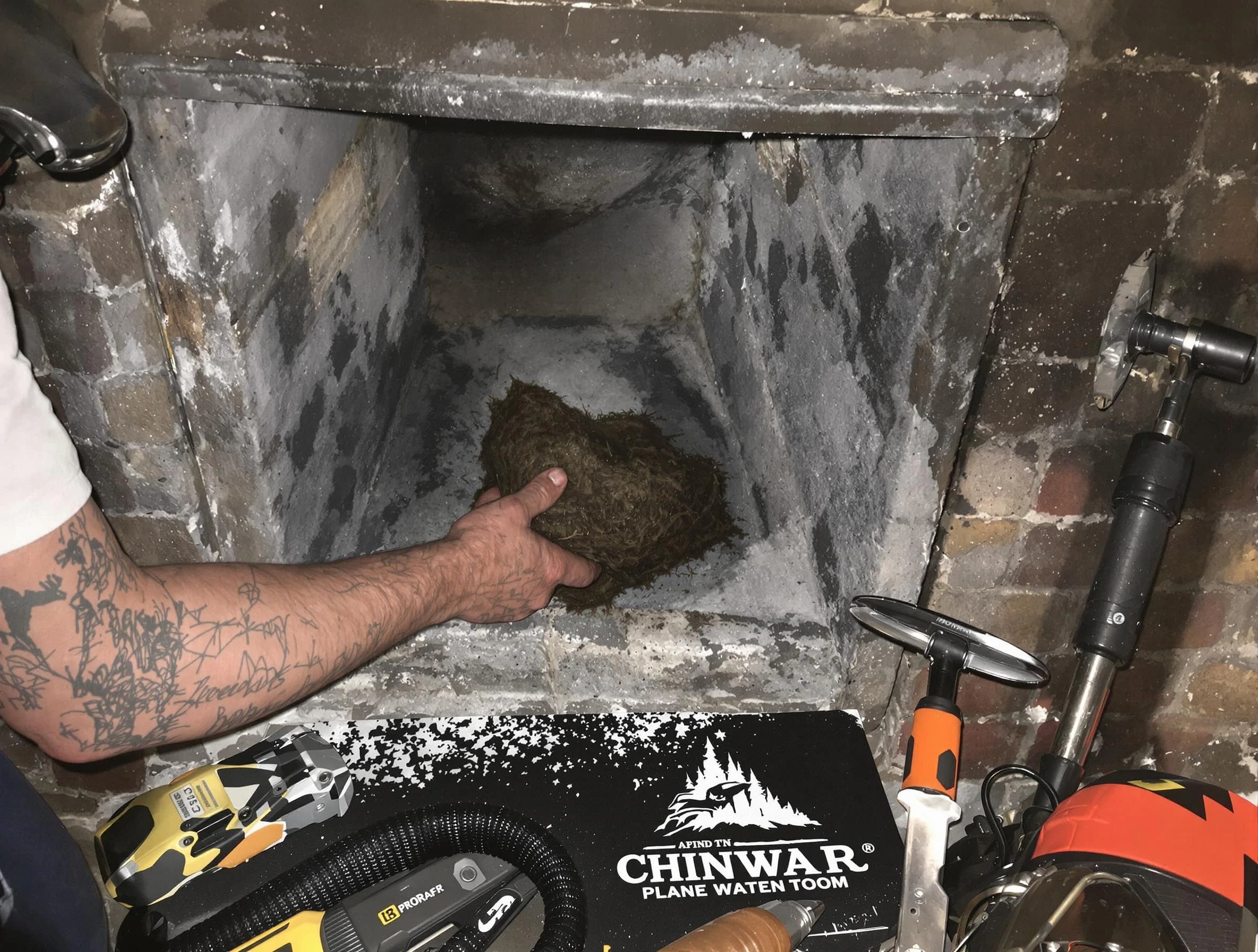 Monroe Chimney Sweep safely removing debris and screening chimney in Monroe, NJ